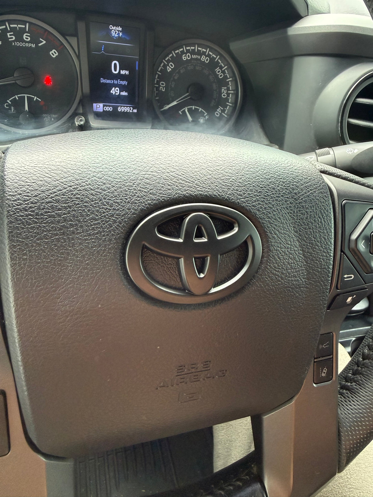 Matte Black Steering Wheel Emblem Cover — Fits 3rd Gen Tacoma (2016–2023)