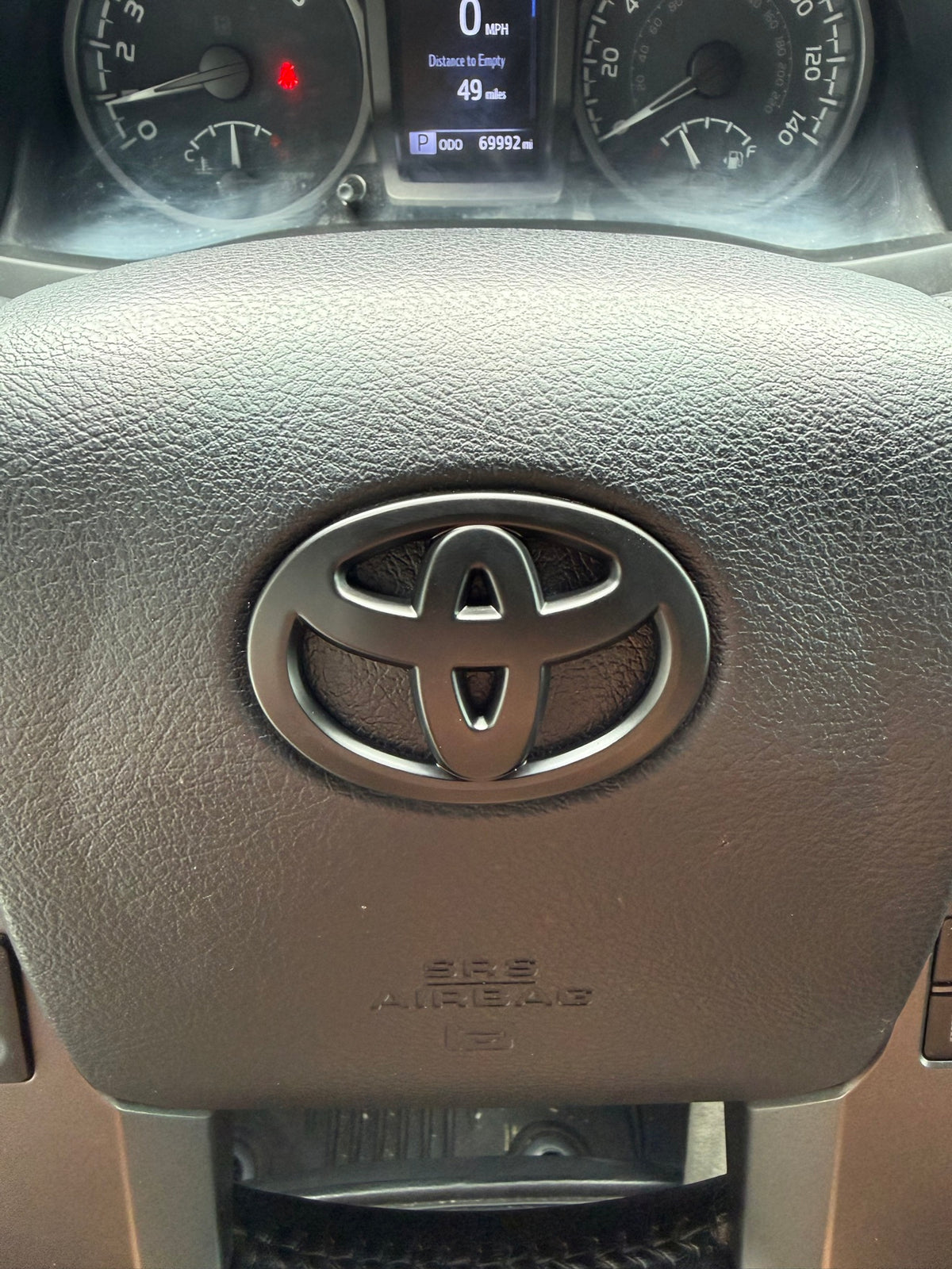 Matte Black Steering Wheel Emblem Cover — Fits 3rd Gen Tacoma (2016–2023)