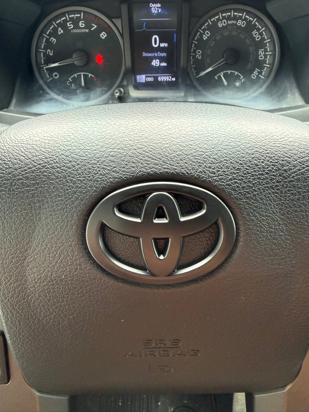 Matte Black Steering Wheel Emblem Cover — Fits 3rd Gen Tacoma (2016–2023)