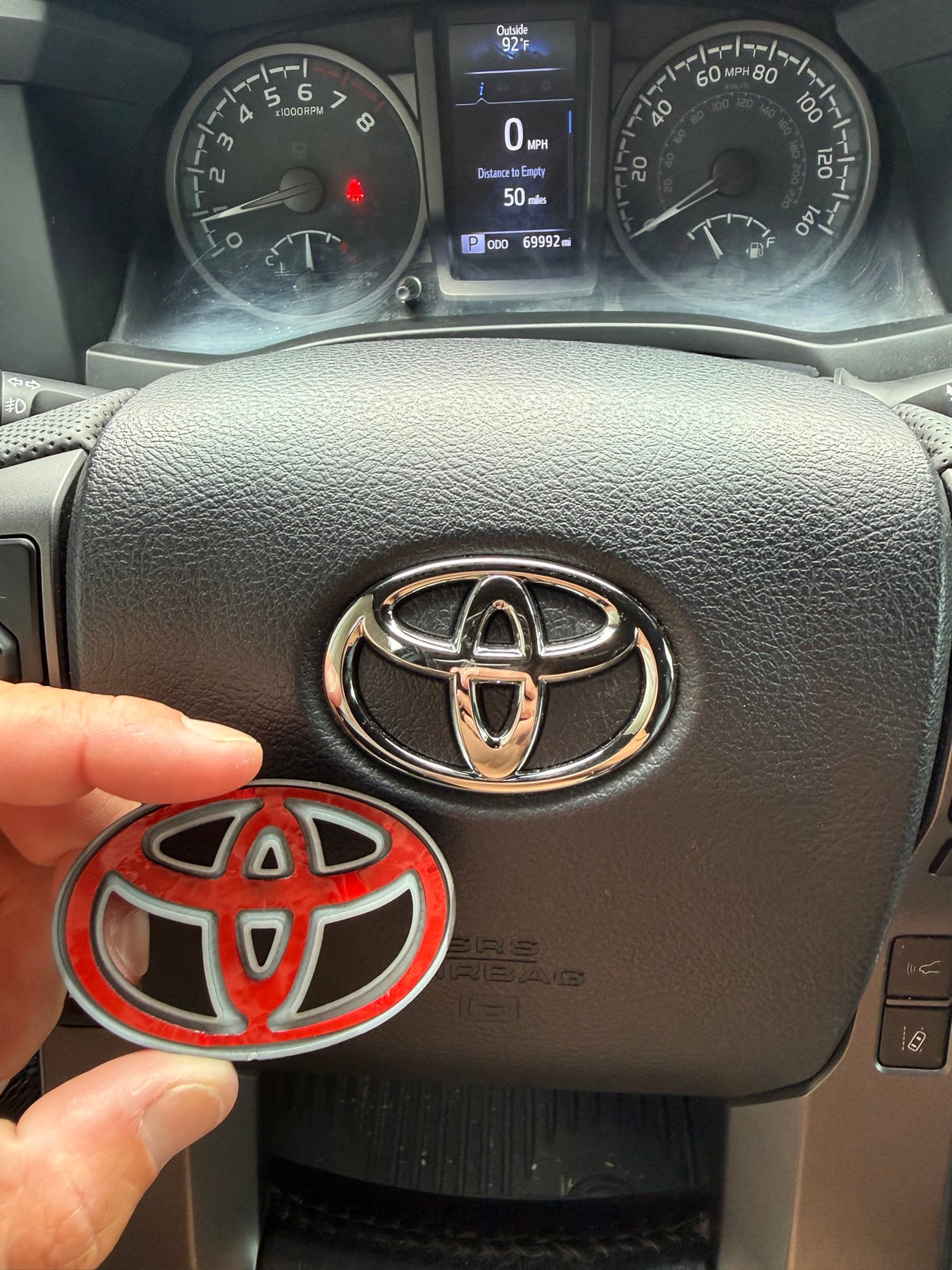 Matte Black Steering Wheel Emblem Cover — Fits 3rd Gen Tacoma (2016–2023)